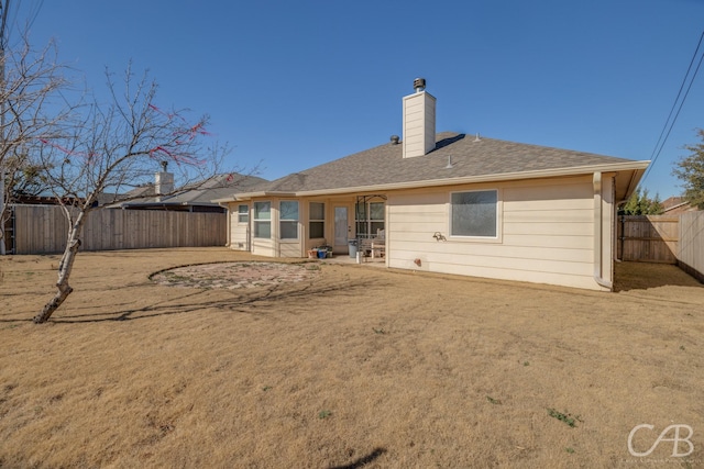 back of property with a patio area