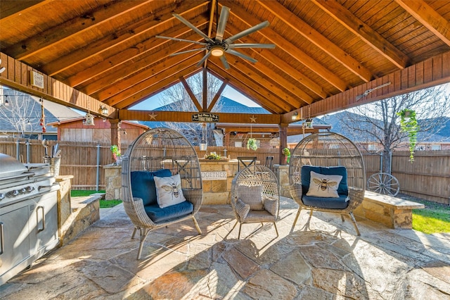 view of patio with a gazebo, ceiling fan, and area for grilling