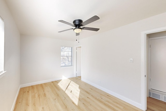 spare room featuring ceiling fan and light wood-type flooring