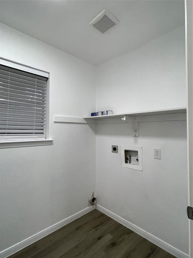 laundry area with hookup for an electric dryer, washer hookup, and dark hardwood / wood-style floors