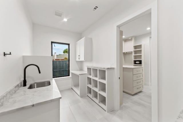 laundry area featuring sink