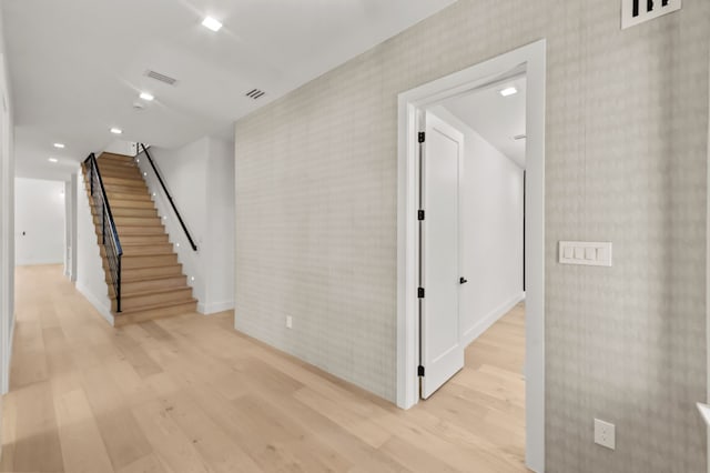 hallway featuring light hardwood / wood-style flooring