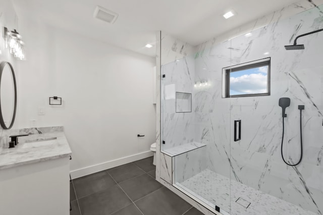 bathroom featuring walk in shower, tile patterned floors, vanity, and toilet