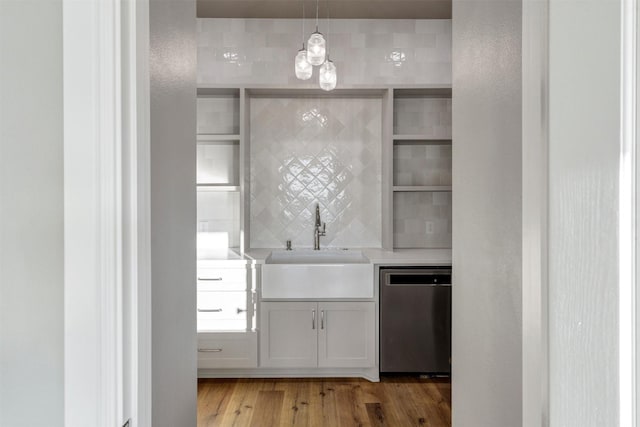 bathroom featuring sink and hardwood / wood-style floors