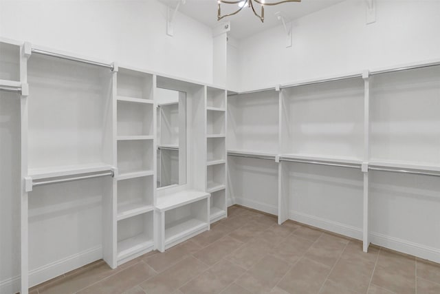 walk in closet featuring light tile patterned floors