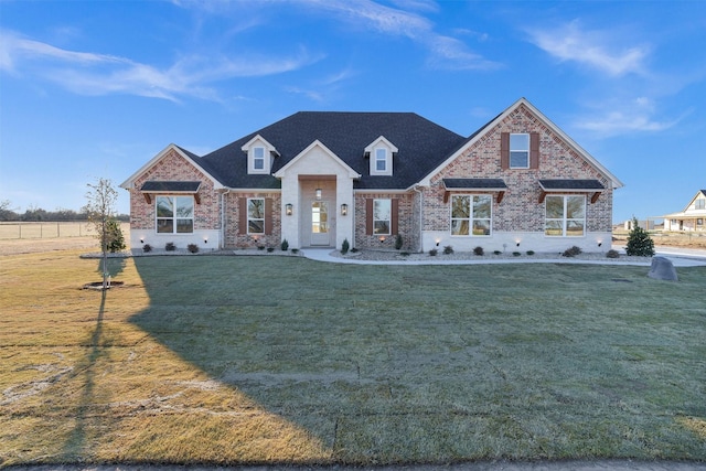 view of front facade featuring a front yard