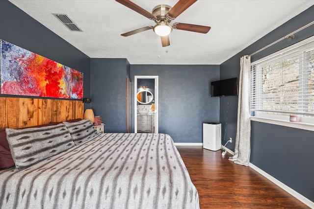 bedroom featuring dark wood-type flooring and ceiling fan