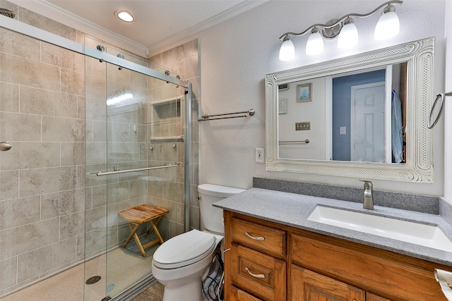 bathroom with walk in shower, ornamental molding, toilet, and vanity