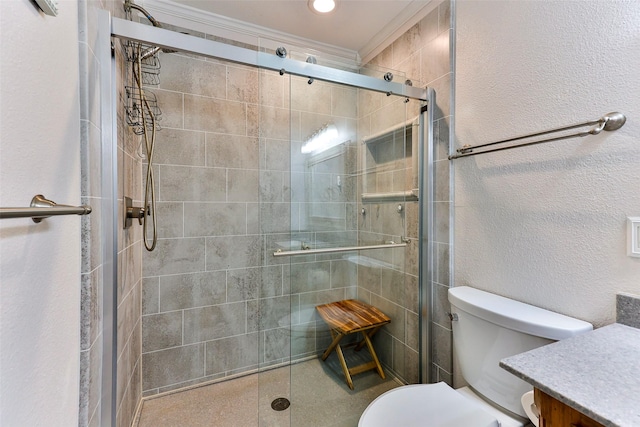 bathroom with an enclosed shower, vanity, and toilet