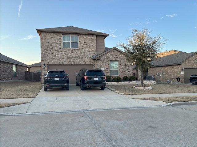 view of front of property with a garage