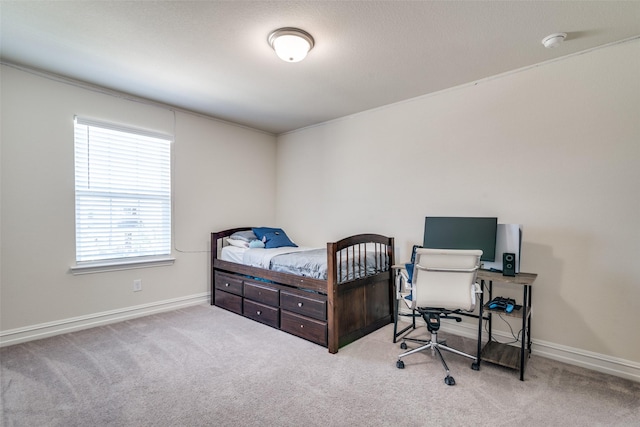 bedroom featuring light carpet