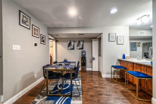 dining room featuring dark hardwood / wood-style flooring