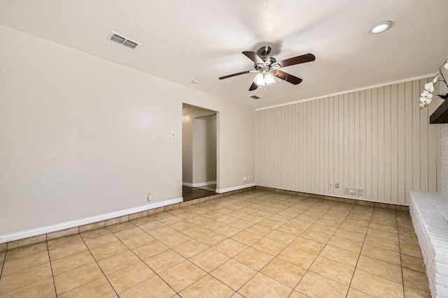 spare room with ceiling fan