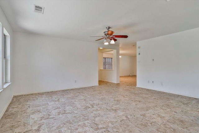 empty room featuring ceiling fan