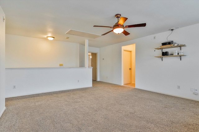 unfurnished room with light colored carpet and ceiling fan