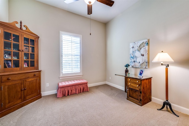 miscellaneous room featuring light carpet and ceiling fan