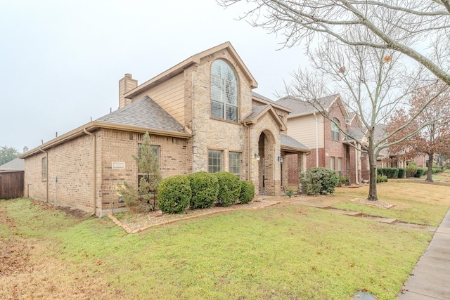 front facade with a front yard