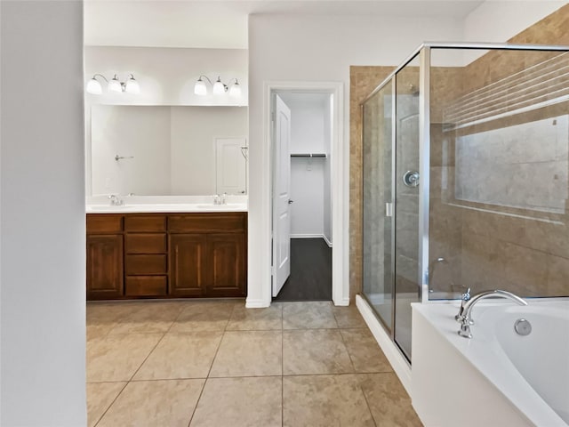 bathroom featuring vanity, tile patterned floors, and independent shower and bath