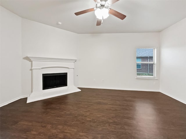 unfurnished living room with ceiling fan