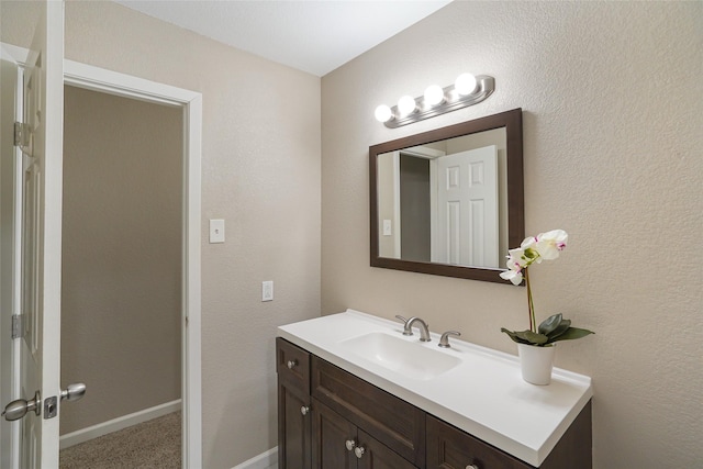 2658 Via Valencia, Carrollton, TX 75006 - bathroom with vanity and baseboards