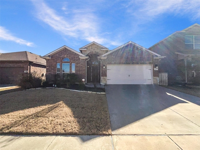 single story home featuring a garage