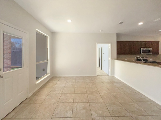 interior space with light tile patterned flooring