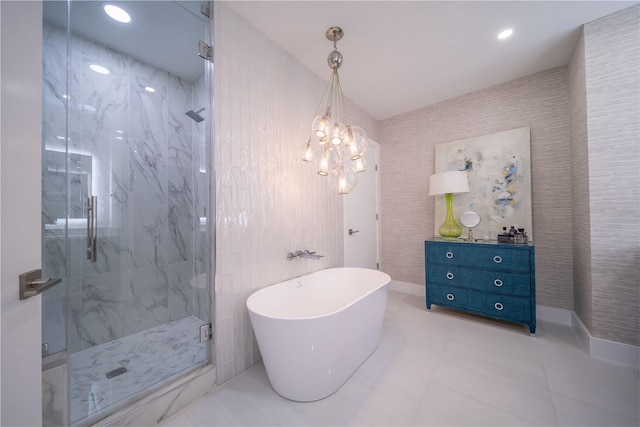 full bath featuring recessed lighting, a marble finish shower, tile walls, a soaking tub, and vanity