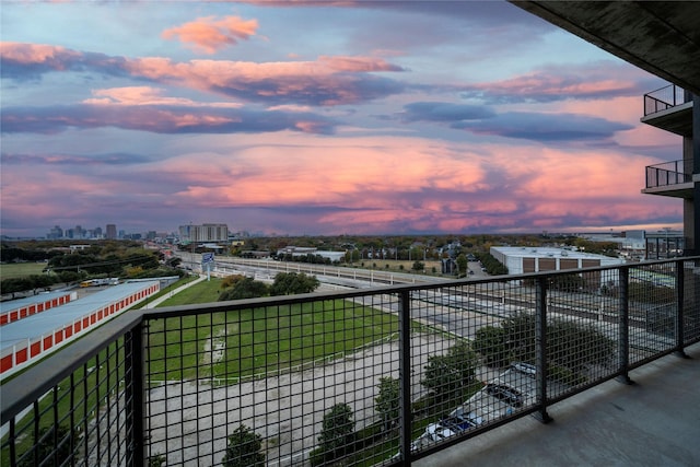 balcony at dusk with a city view