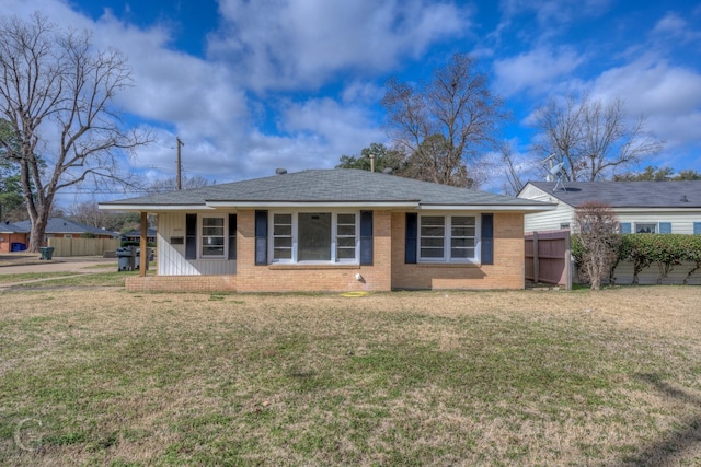 view of front of property featuring a front lawn and a porch