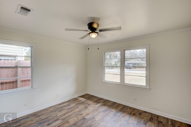 unfurnished room featuring crown molding, ceiling fan, and dark hardwood / wood-style flooring