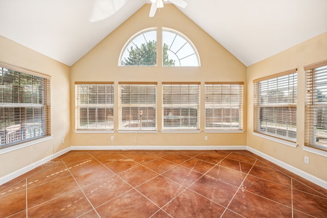 unfurnished sunroom featuring lofted ceiling and ceiling fan