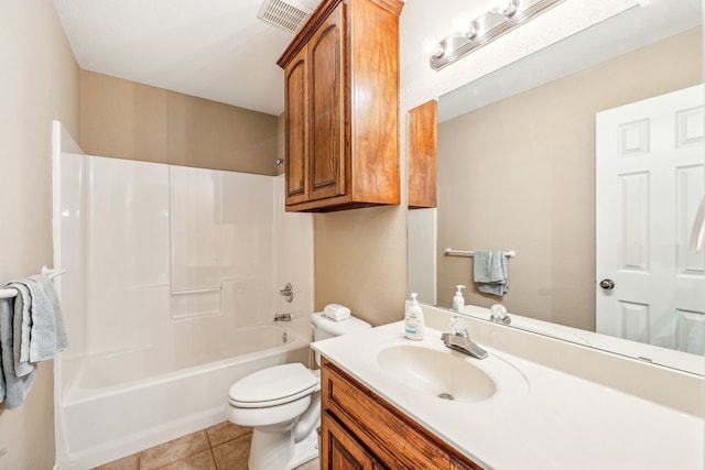 full bathroom featuring vanity, tile patterned floors, toilet, and washtub / shower combination