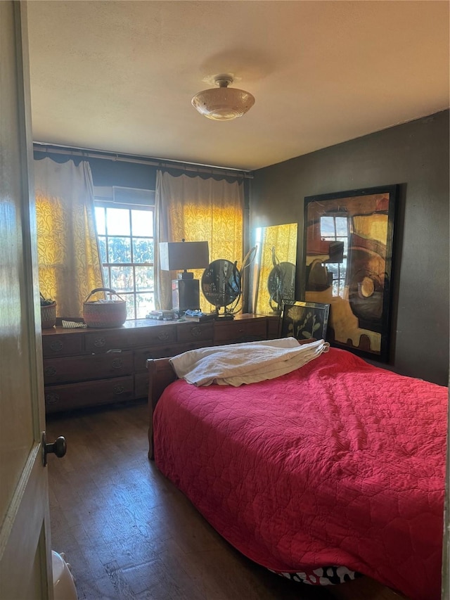 bedroom featuring wood-type flooring