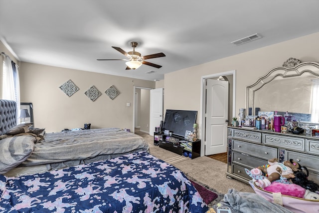 carpeted bedroom with ceiling fan