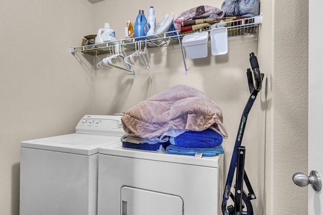 laundry room featuring washing machine and dryer