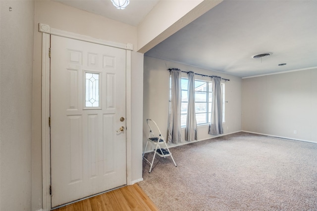 foyer with carpet