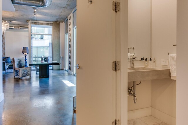 washroom with cabinets and washer and dryer