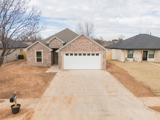 view of front of property with a garage