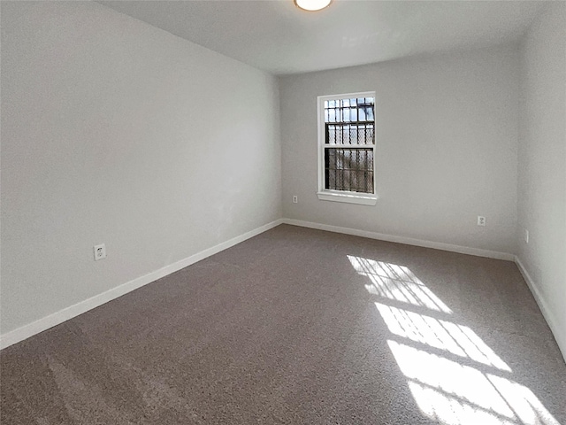 empty room featuring carpet floors