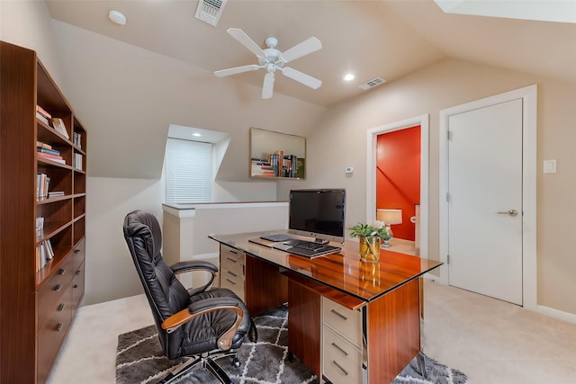 office with vaulted ceiling, light colored carpet, and ceiling fan