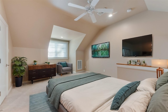 carpeted bedroom with lofted ceiling and ceiling fan