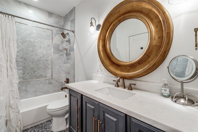 full bathroom with vanity, shower / tub combo, and toilet