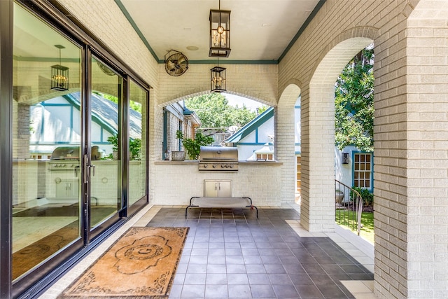 view of patio featuring a grill and exterior kitchen