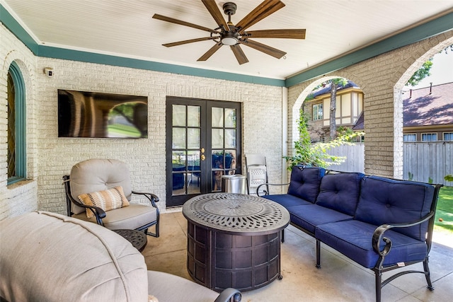 view of patio / terrace with outdoor lounge area, ceiling fan, and french doors