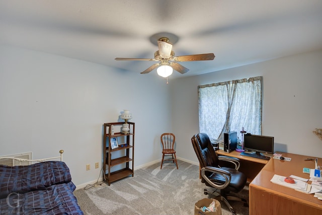 carpeted office with ceiling fan