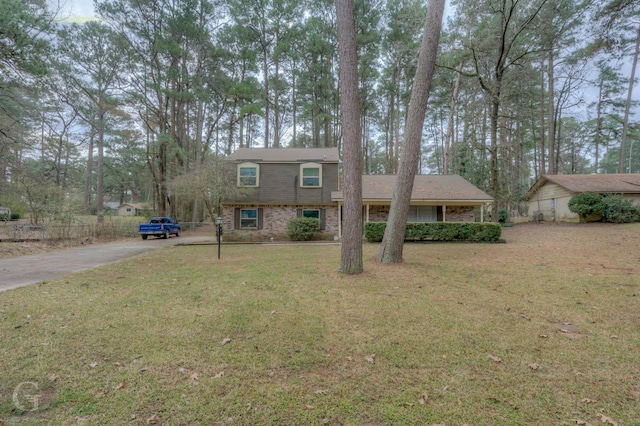 split level home with a front yard