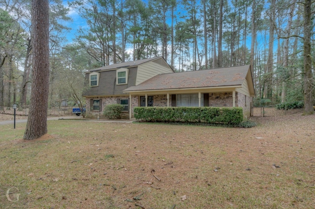 view of front of home with a front yard