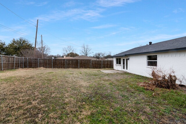 view of yard featuring a fenced backyard and a patio area