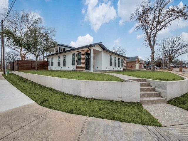 view of property exterior featuring a yard