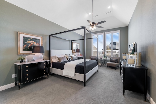 carpeted bedroom with vaulted ceiling and ceiling fan